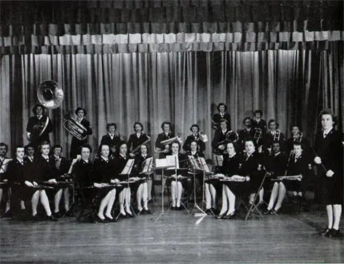 The First All-Wave Band . . . Women of the Women’s Reserve in Varied Rates and Jobs .......but Musicians All When They Swing Out On “Anchors Aweigh” and “Waves of the Navy”