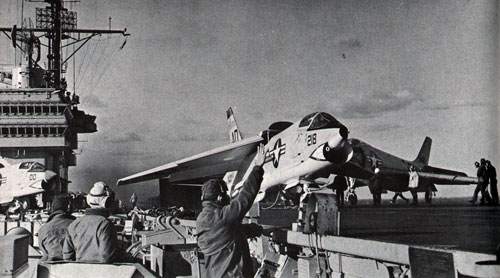 Pilot of modern jet readies for blast-off from USS Forrestal (CVA 59) during flight operations.