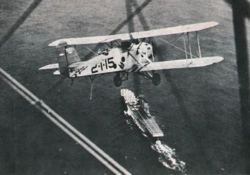 Navy fighter of '32 heads for USS Saratoga (CV 3). 