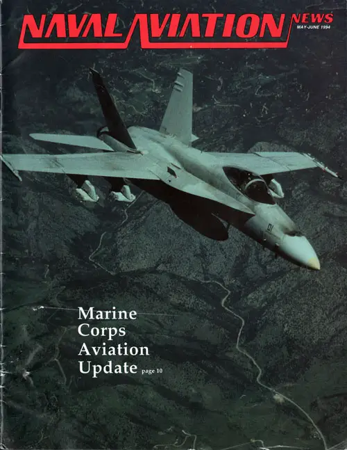Front Cover, Naval Aviation News, May-June 1994: An FA-18A Hornet of reserve squadron VMFA-321 flies over the target range at NAS Fallon, Nev., during active duty training (PH2 Bruce Trombecky).