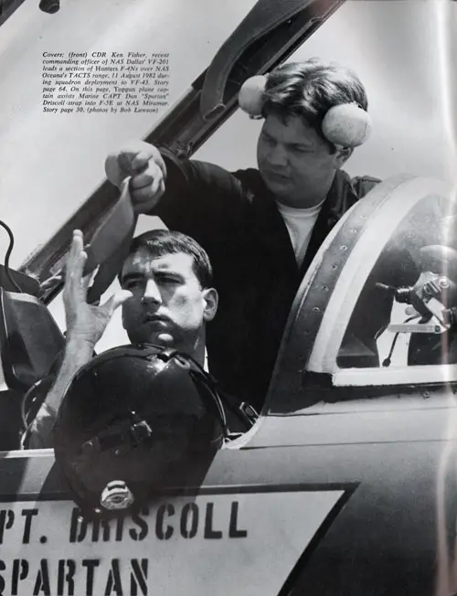 Topgun plane captain assists Marine Capt. Dan "Spartan" Driscoll strap into F-5E at NAS Miramar.