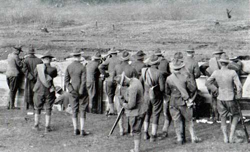 Close-up view of men at firing line