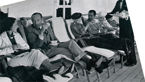 Relaxing on a Deck Chair, Enjoying a Cup of Bouilion in the Morning With Fellow Passengers on the RMS Empress of Britain.