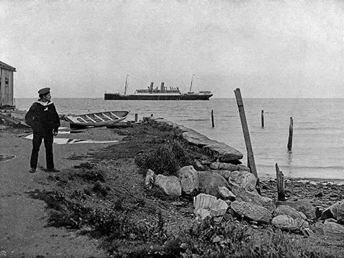 The SS Blücher in Trondhjem harbor - Norwegian Sailor in Foreground. Photo 050, Northland Trips Book of Photographs, Hamburg-American Line, 1908.