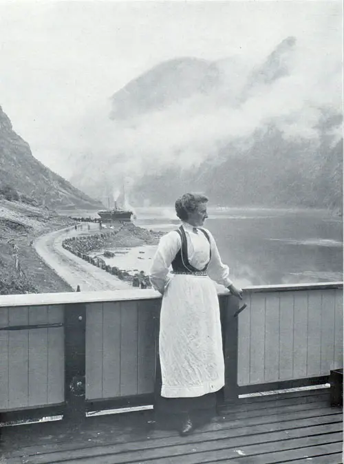 Photo 118: Norwegian woman at Nærøyfjorden wearing a traditional Norwegian Folk Costume or Bunad. 