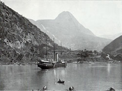 Photo 097: View of a coastal steamer at the village of Merok in Geiranger Fjord, Norway.