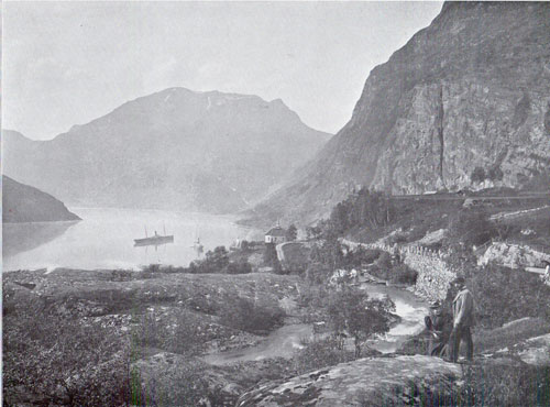 Photo 099: View of the Fjord and coastal steamer from the village of Merok in Geiranger Fjord, Norway.