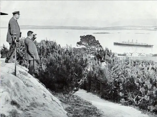 Photo 039: Harbor Master Viewing Steamship in the Harbor at Molde, Norway