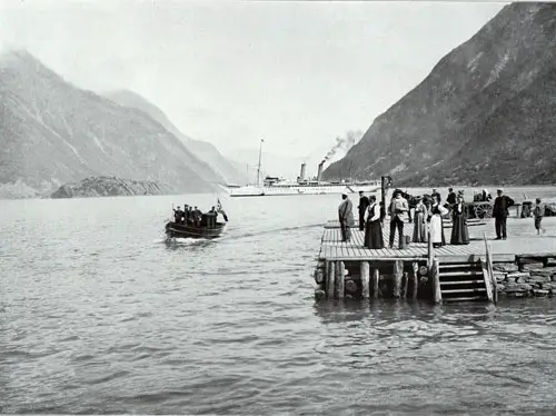 The SS Prinzessin Victoria Luise at Odda. People, Possibly Immigrants, Waiting at the Pier for the Tender to Arrive From the Steamer.