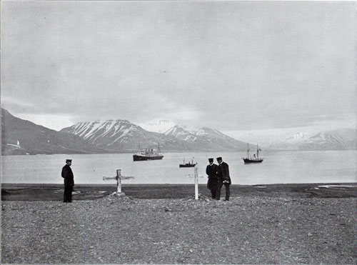 Photo 080: The graves of shipwrecked in Foreground with view of two steamships in background in Advent Bay, Spitsbergen