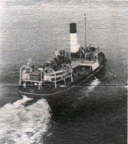 At Cobh, a Roomy Tender Picks up Passengers for Destination in Ireland.