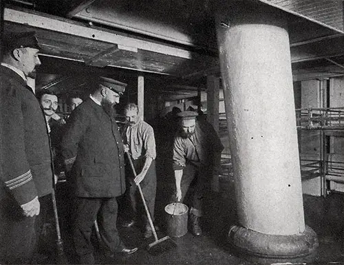 Captain Berends Observes the Cleaning Up In the Steerage.