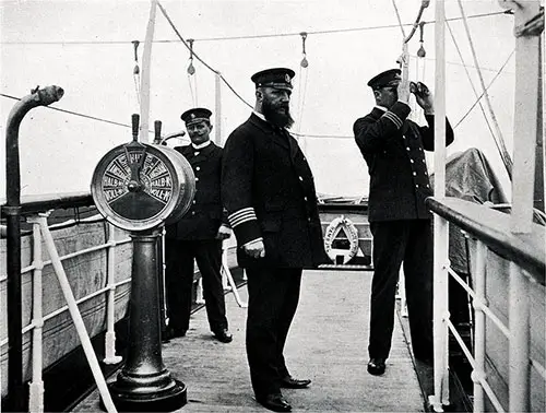 Officers on the Bridge of the SS Augusta Victoria. Captain Berends and Chief Officer Are Watching a Passing Ship.