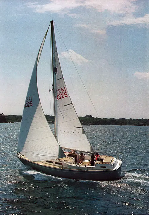 The Luxurious O'Day 32 Cruising Sailboat has a Center Cockpit and Aft Cabin.