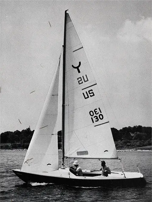 Couple Sailing Near the Shoreline in Their New 1971 O'Day Yngling.