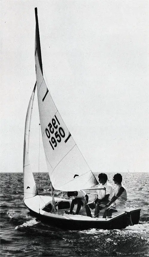 A Family of Three Enjoy a Fun Day of Sailing in the New 1971 O'Day Widgeon Sailboat.