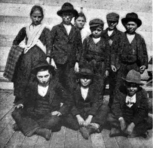 Group of Newly Arrived Immigrants at Ellis Island. Lessons for Junior Citizens, 1906.