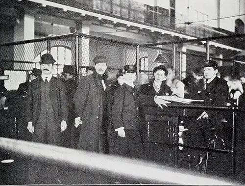 Inspectors and Immigrants at Ellis Island.
