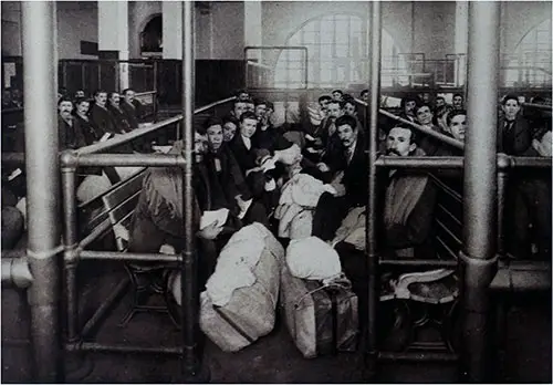 Potential Immigrants Wait in the Area Known as the Emigrant Pen at Ellis Island.