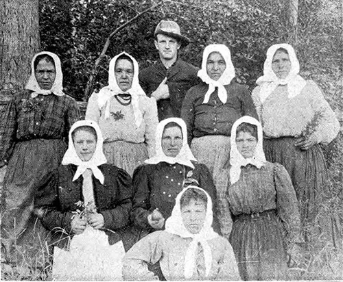 Group of Polish and Ruthenian (East Slavic) Women with a Canadian Overseer.
