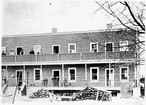 A Tenement Built on the Rear of a Lot so that Several Similar Buildings may be Built in Front.