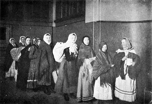 Immigrant Women in Line for Inspection at Ellis Island.