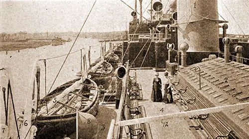 View of the Sun Deck Amidships With More Space To Walk. Note the Lifeboats Along the Left Side of the Photograph.