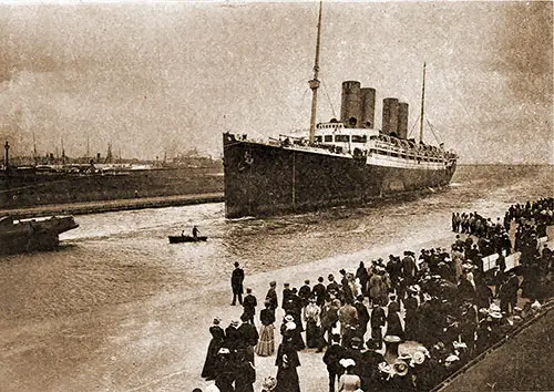 The SS Kaiser Wilhelm II Entering Bremenhafen. A Large Crowd Has Assembled at the Pier to Greet the Ship.