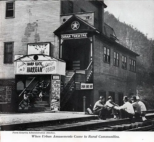 When Urban Amusements Come to Rural Communities. Signage Shows Marqee for "George O'Brien's Hard Rock Harrigan," "Union Shoe Shop," and "Omar Theatre." Youths are Shown Sitting on the Stairs and on the Side of the Building.