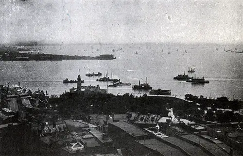 View of Busy New York Harbor with Many Steamships Visible in Foreground and Background.