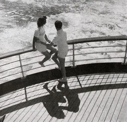 Deck Scene - Young Couple on the Fantail of the SS Ile de France.