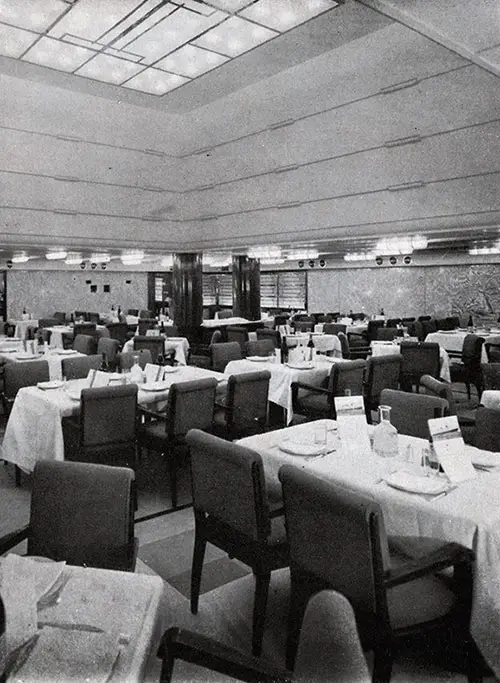 The Third Class Dining Room on the SS Normandie is Decorated in Marble and Warmly Lighted by Luminous Dome.
