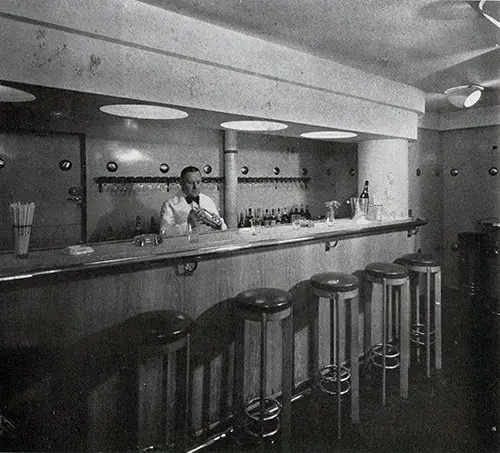 The Smart Modern Bar of the Normandie Third Class has a Jolly, Companionable Atmosphere.