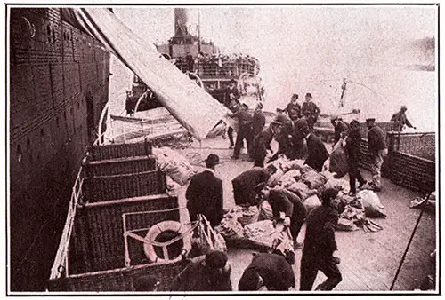 Mail Tender Receiving Outgoing Mail from Cunard Steamer and Taking on Mail to Be Sorted During Voyage by Sea Post Employees