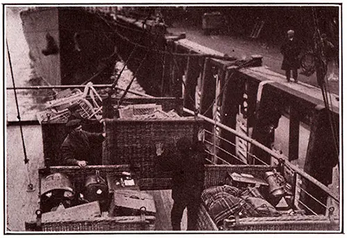 Landing Passengers Luggage at the Quayside, Fishguard.