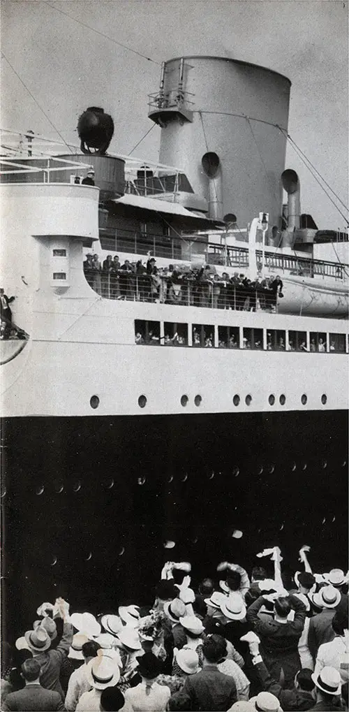 Crowd on the Pier Wave Goodbye to Passengers Headed for Europe.