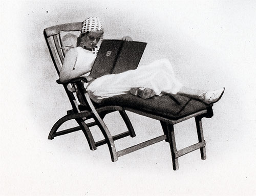 A Passenger Is Fully Relaxed in Their Deck Chair.