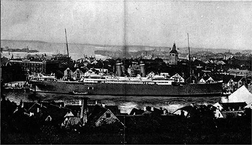 View of Stavanger Harbor with Norwegian America Line Steamship in Port.