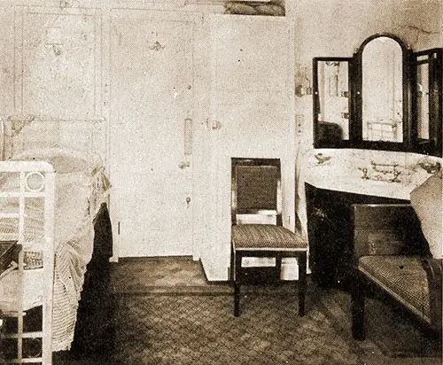 A Stateroom on the Belgenland with a Single Metal Bed.