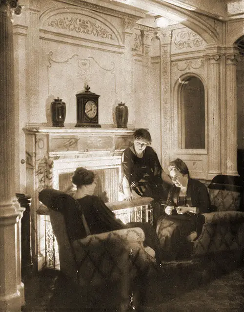 Women Having a Firelight Chat in the First Class Drawing Room.