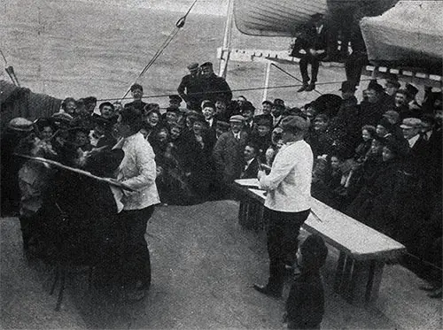 Amusements onboard. The emigrants perform a parody of "The Barber of Seville."