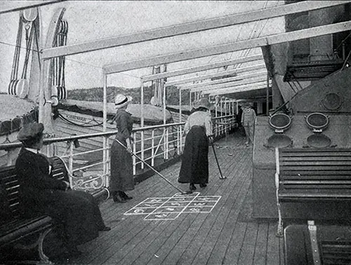First Class Passengers Play Shuffleboard on the Upper Promenade Deck, SS United States.