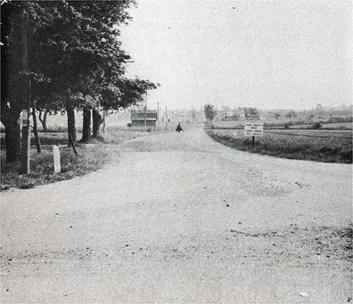 Typical of Farm-To-Market Roads Constructed by WPA and Already in Use Is This Gravel-Top Road Near Fredonia.