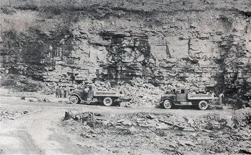 Solon Quarry, Employing Thirty Relief Workmen, Supplies Rock for County Roads.