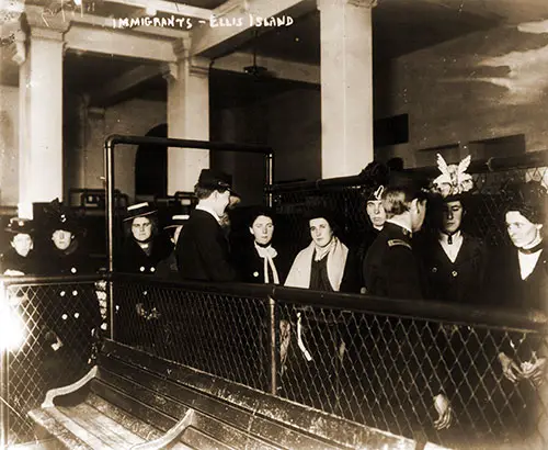 Line of Female Immigrants Undergoing Inspection at Ellis Island circa 1912.