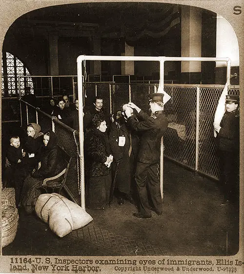 U.S. Inspectors Examining Eyes of Immigrants, Ellis Island, New York Harbor.