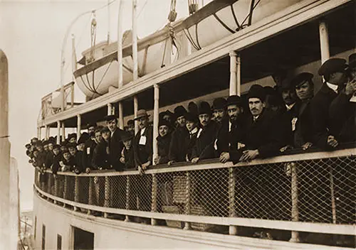 Immigrants on Ferry Boat Approaching Ellis Island.