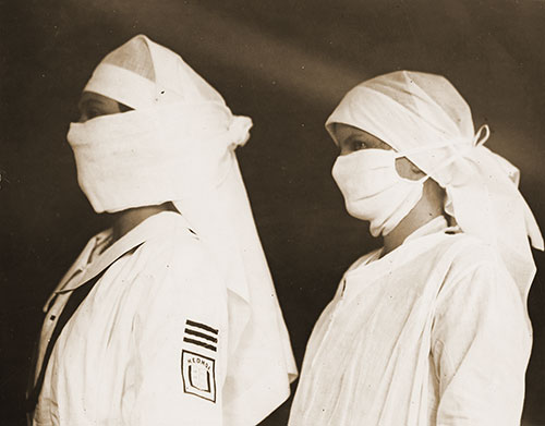 Nurses in Boston Hospitals Equipped to Fight Influenza Wearing Masks for Protection Against Influenza, 12 May 1919.