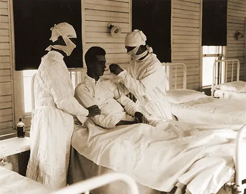 US Naval Hospital, New Orleans, LA Treating an Influenza Patient, 1918.