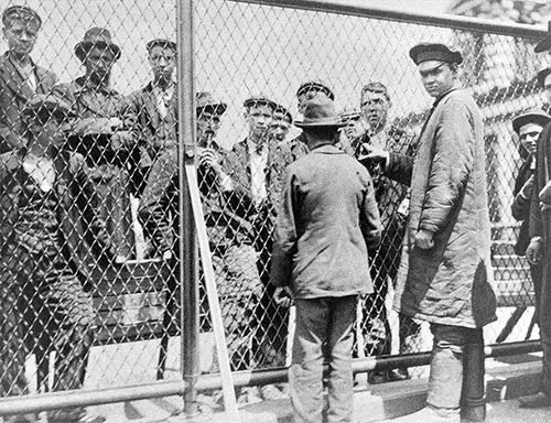 Detention Pen On the Roof of the Main Building at Ellis Island, Where Emigrants Held for Deportation May Go in Fine Weather.